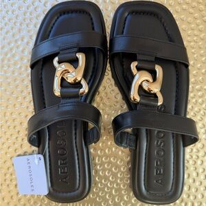 AEROSOLES Black Sandals with Gold Chain Detail